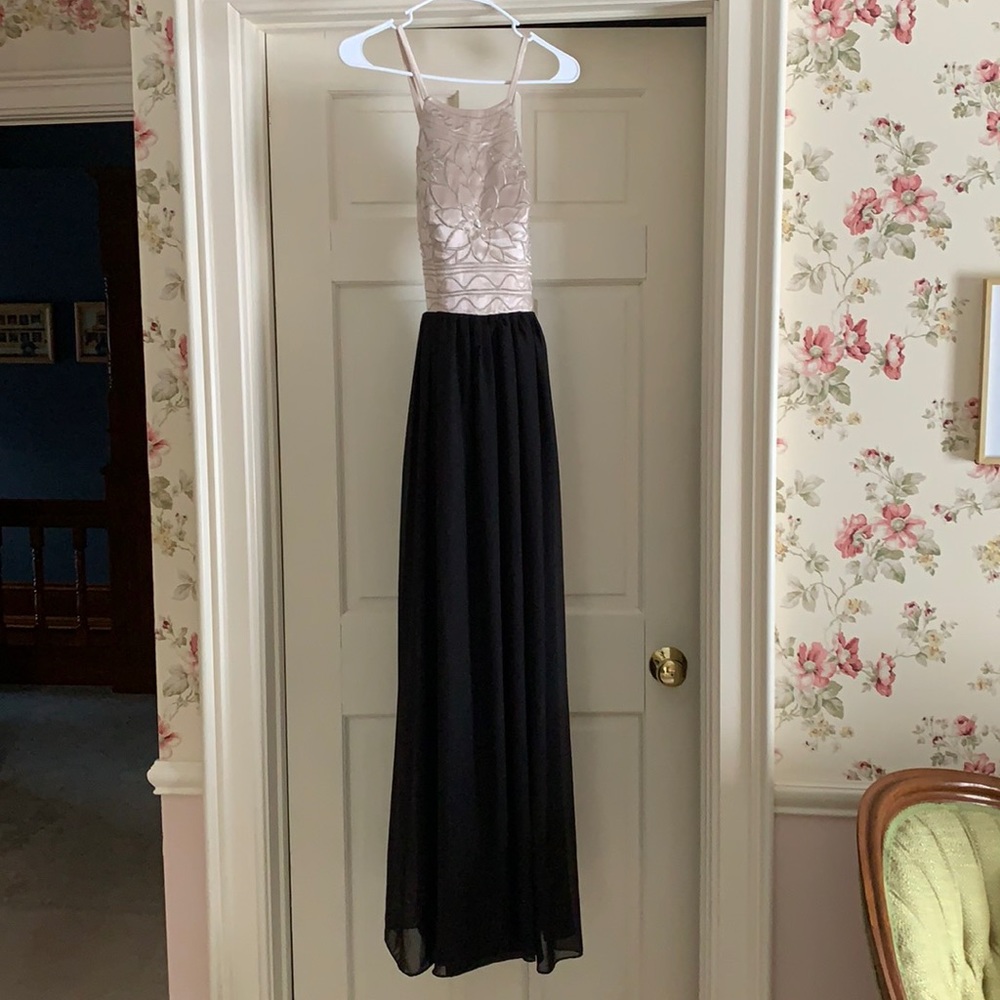 Beautiful cream and black fully lined bridesmaid/special occasion long dress.